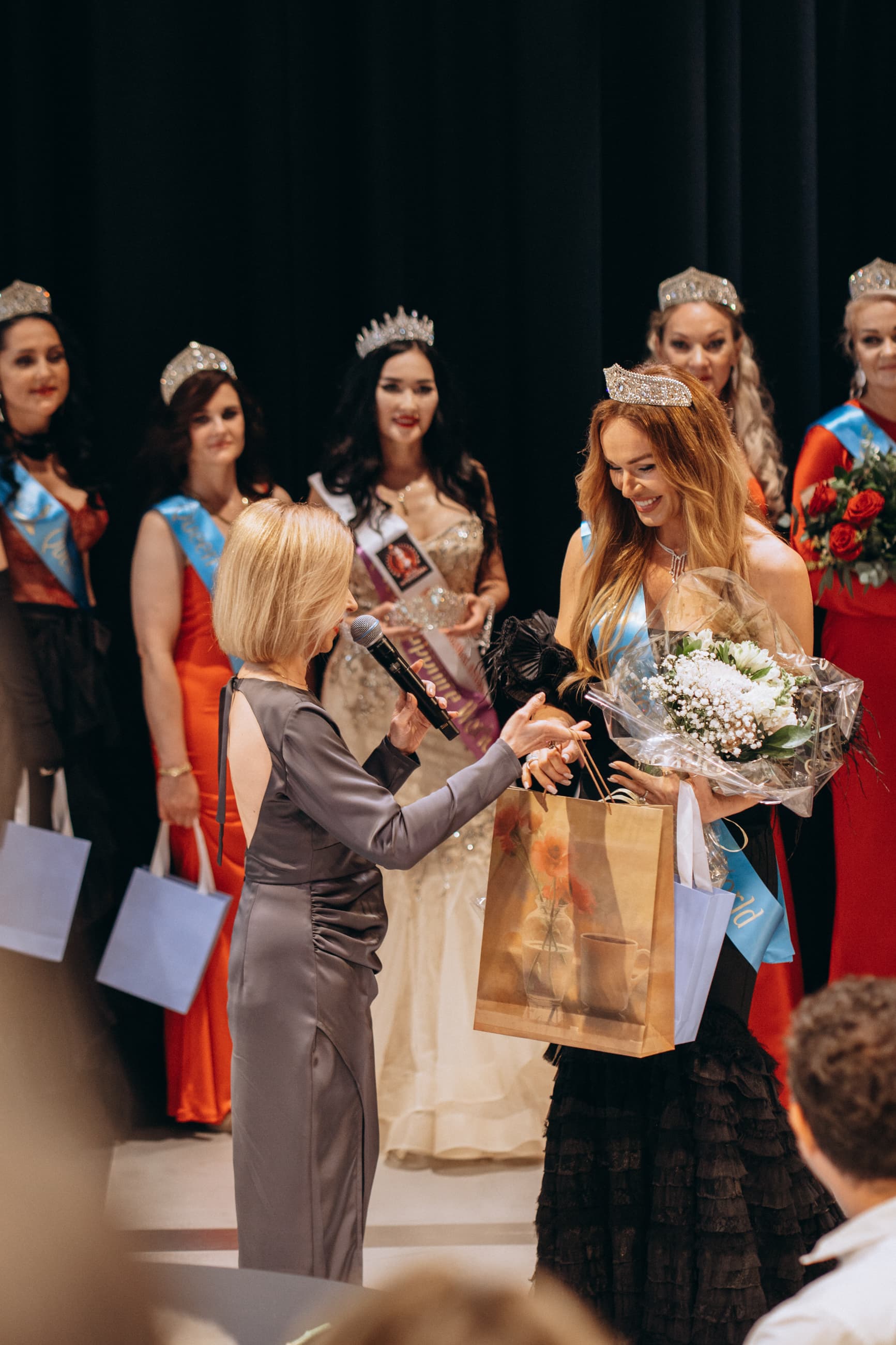 A contestant preparing to step onto the stage
